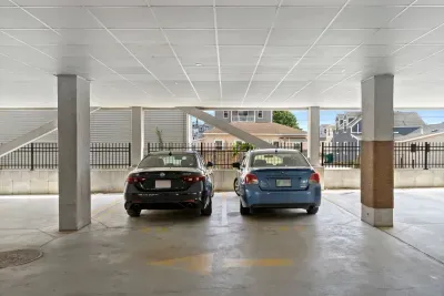 Covered garage with 2 exlusive parking spots for our unit.