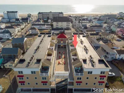 Aerial view of "Ashworth Place", just steps to the beach, boardwalk and top attractions.
