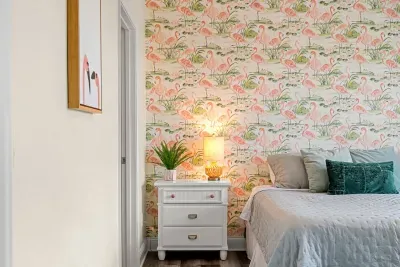Primary bedroom with king bed, two large closets, smart TV and en-suite bathroom.