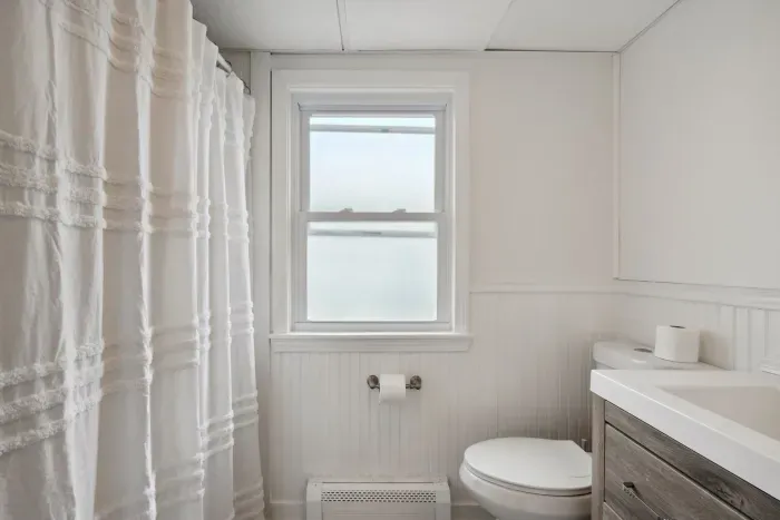 Full bathroom with a shower and tub