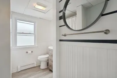 Full bathroom with a shower and tub