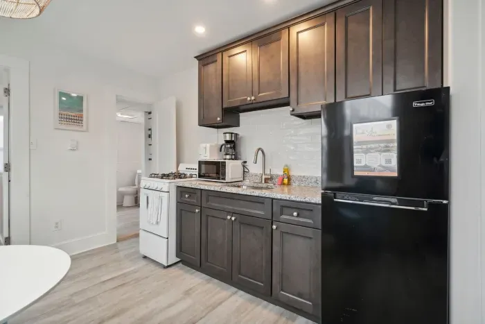 Well-equipped kitchen with all major appliances except a dishwasher