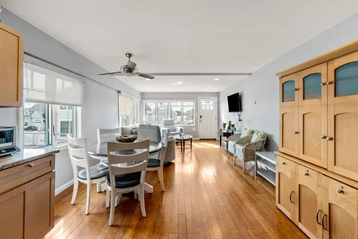 Open concept living area and kitchen. Fully equipped with all major appliances, including a dishwasher.The hutch on the right is a fold away desk!