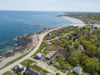 Aerial view of "Snug Harbor", across the street from the ocean, large lawn area to relax, sunbath, and walking distance to Wallis Sands