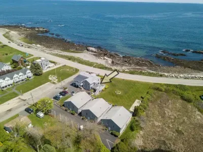aerial view of "Snug Harbor", across the street from the ocean, large lawn area to relax, sunbath, and walking distance to Wallis Sands