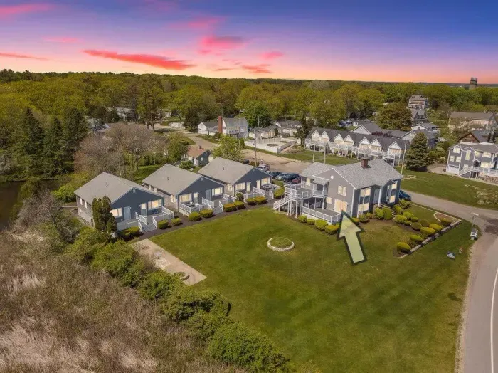 Aerial view of "Snug Harbor", across the street from the ocean, large lawn area to relax, sunbath, and walking distance to Wallis Sands