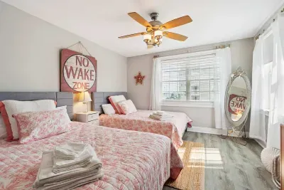 Bedroom #2 with 2 Queen beds. Clean linens and towels provided.