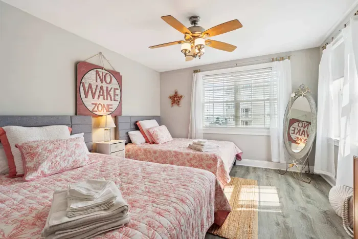 Bedroom #2 with 2 Queen beds. Clean linens and towels provided.