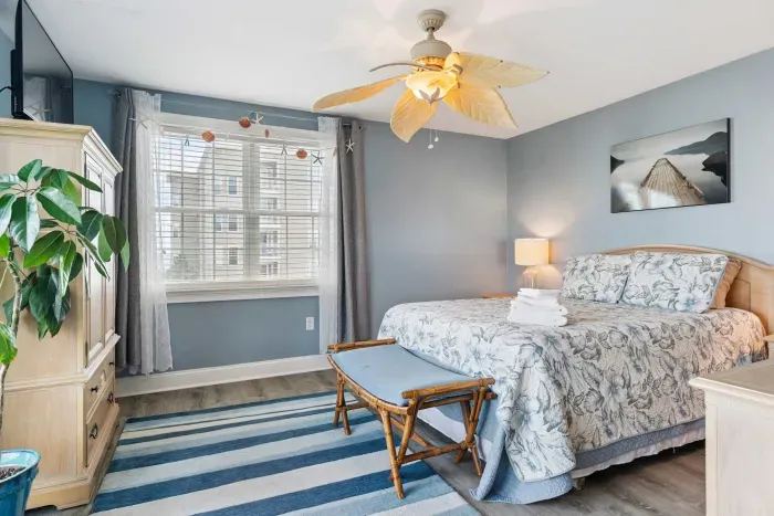 Primary bedroom with queen bed.