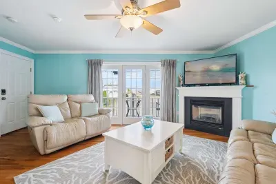 Open living room with a Smart TV and gas fireplace