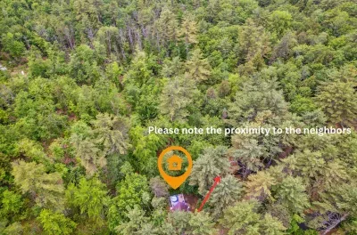 While Camp Conway is surrounded by woods, there are neighbors on either side. Please be advised before booking.