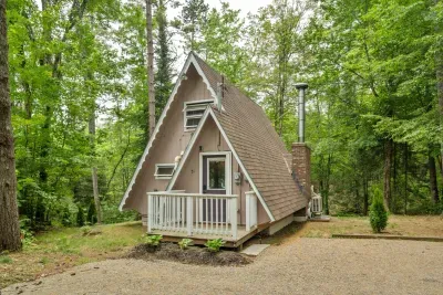 Camp Conway from the neighborhood street! Please note that the parking appears larger in the photo. It is suitable for 2 large cars or 3 smaller cars. 