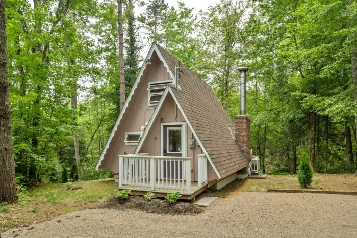 Camp Conway from the neighborhood street! Please note that the parking appears larger in the photo. It is suitable for 2 large cars or 3 smaller cars. 