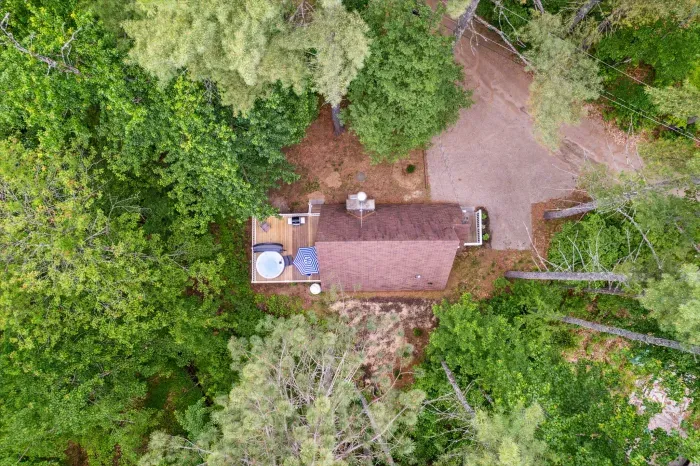 An aerial view of Camp Conway. PLEASE NOTE this home is not secluded in the woods. There are neighbors on each side of the home. 