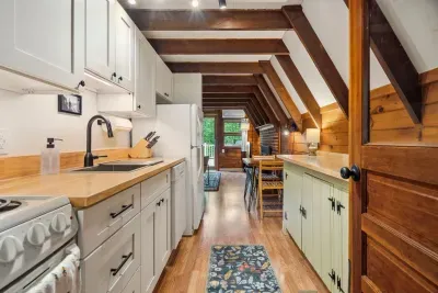 The kitchen is fully equipped with all the essentials, like cookware, plates, moka espresso pot, tea kettle, drip coffee, utensils, and a dishwasher! The cabinets are brand new as of 2025!
