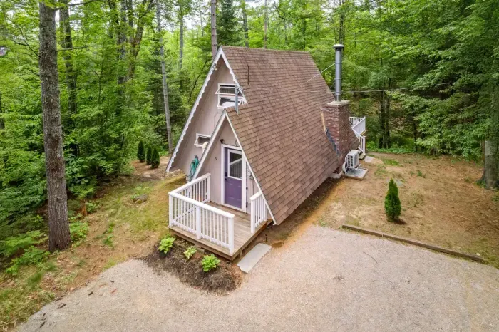 Welcome to Camp Conway! The driveway has parking for 3 small cars or 2 larger ones. PLEASE NOTE that this home does have neighbors on each side of the home. 