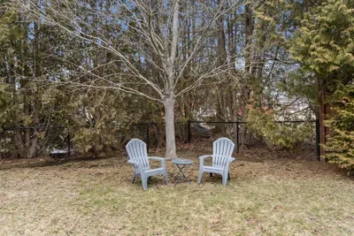This beautiful and secure fenced-in backyard is spacious, dog-friendly, and perfect for outdoor activities and relaxation, providing a safe and fun environment for your adorable dogs.