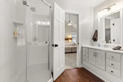 This ensuite bathroom is situated in the master bedroom and features a standing shower.