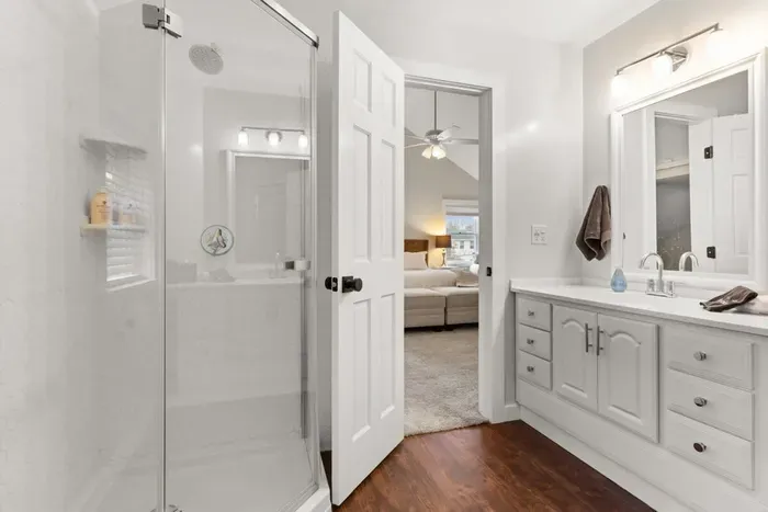 This ensuite bathroom is situated in the master bedroom and features a standing shower.