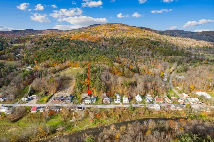 Directly across the street from the Ottauquechee River