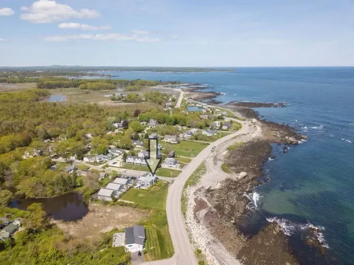 Aerial view of "Snug Harbor", across the street from the ocean, large lawn area to relax, sunbath and, and walking distance to Wallis Sands