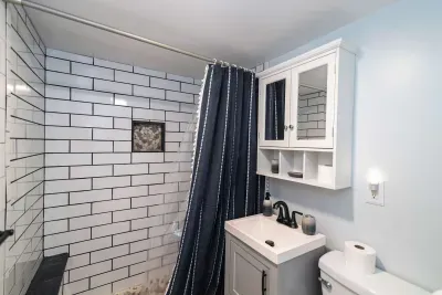 Full bathroom with a beautiful, brand new tiled shower. Clean towels provided.