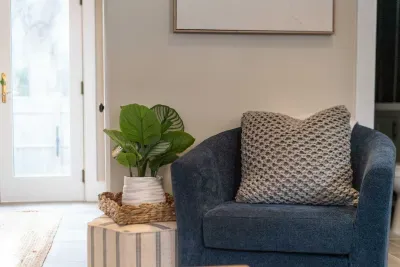 Open concept living room with a brand new sleeper sofa and Smart TV