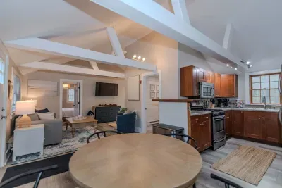 Open concept living room, dining room, and kitchen