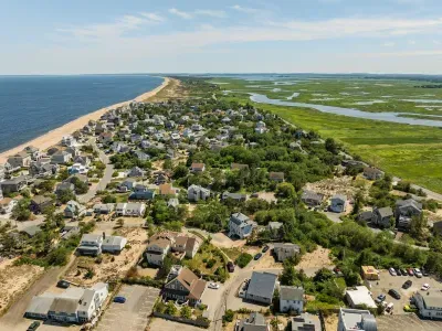 Aerial view of Beach Plum Cottage! This home is located just steps to the beach and in the heart of all the action on Plum Island!