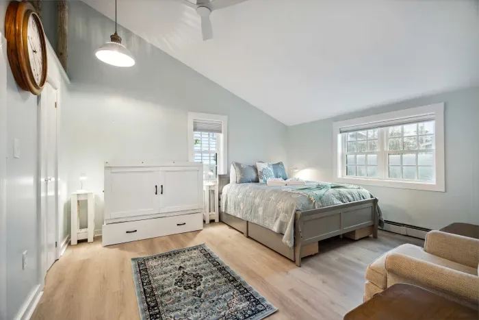 Primary bedroom with queen bed and full size murphy bed. Clean linens provided