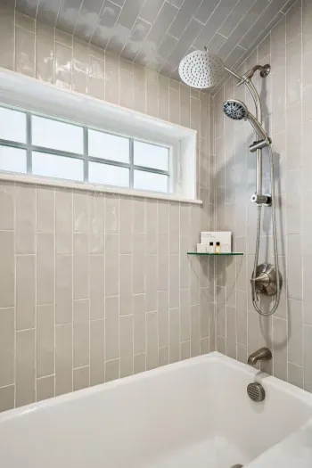 Full bathroom with shower and tub. Clean towels provided for all guests