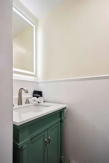 Primary bedroom half bathroom. Clean towels provided for all guests