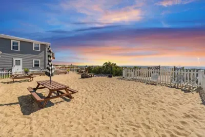 Fenced-in, communal, beach area for the condo building
