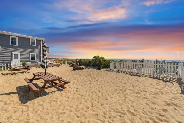 Fenced-in, communal, beach area for the condo building