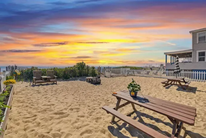 Fenced-in, communal, beach area for the condo building