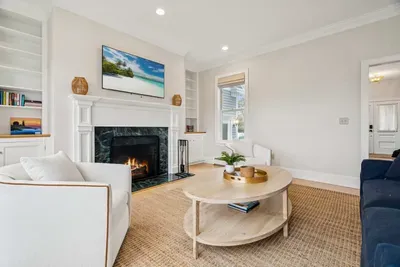 Second living room with a queen sleeper sofa and smart tv. PLEASE NOTE: THE FIREPLACE IS INOPERABLE AND IS NOT TO BE USED