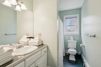 Bathroom #2 Located upstairs outside the bedrooms. There's a tub/shower combo in this room.