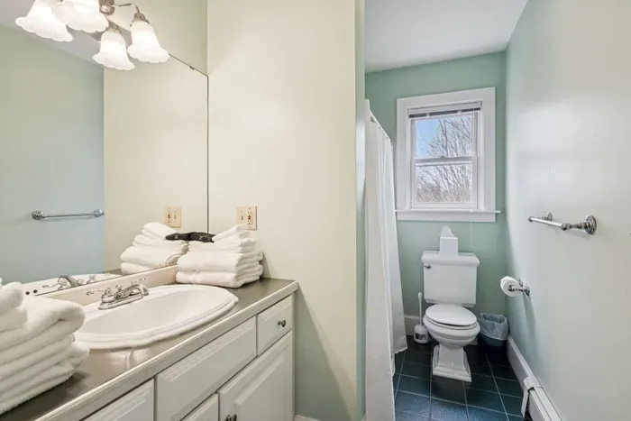 Bathroom #2 Located upstairs outside the bedrooms. There's a tub/shower combo in this room.