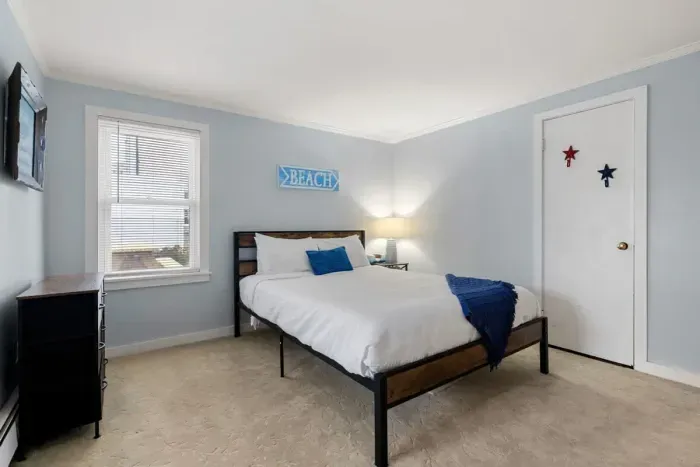 Bedroom #2, located on the first floor with queen bed.