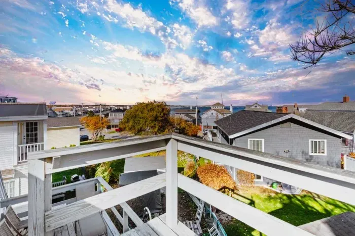 Private deck & roof deck (not to be accessed from Nov-Apr for liability reasons), accessed from the master bedroom, with views of the Atlantic Ocean