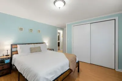 Bedroom #1, located on the first floor with a queen bed.