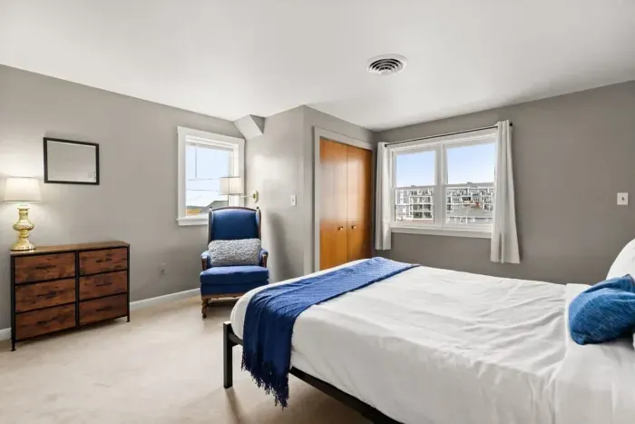 Bedroom #4, located on the second floor with queen bed