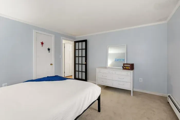 Bedroom #2, located on the first floor with queen bed.