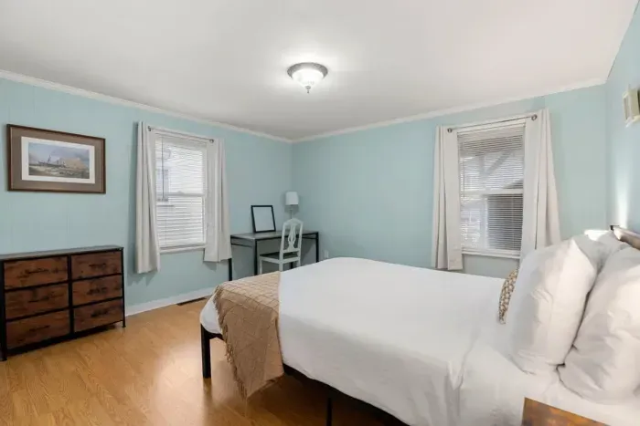 Bedroom #1, located on the first floor with a queen bed.