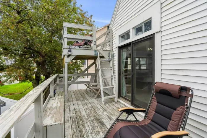 Private deck & roof deck (not to be accessed from Nov-Apr for liability reasons), accessed from the master bedroom, with views of the Atlantic Ocean