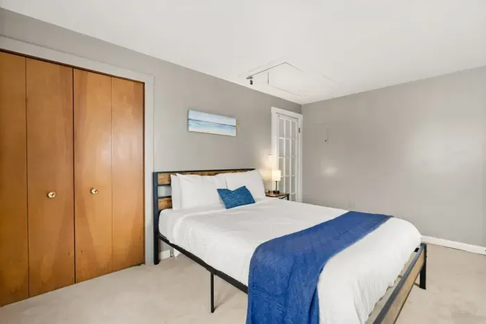 Bedroom #4, located on the second floor with queen bed