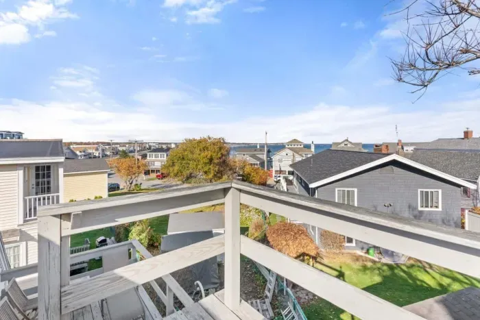 Private deck & roof deck (not to be accessed from Nov-Apr for liability reasons), accessed from the master bedroom, with views of the Atlantic Ocean