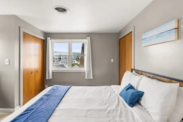 Bedroom #4, located on the second floor with queen bed