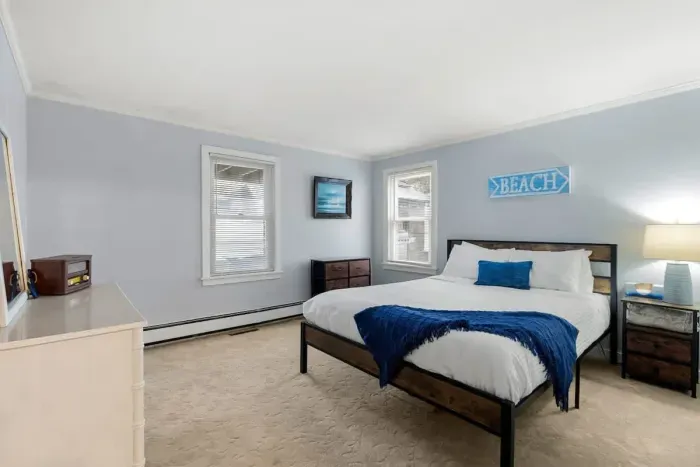 Bedroom #2, located on the first floor with queen bed.