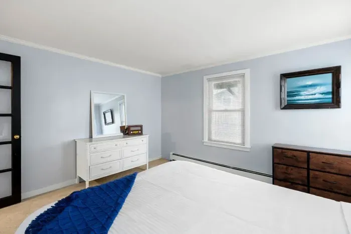 Bedroom #2, located on the first floor with queen bed.